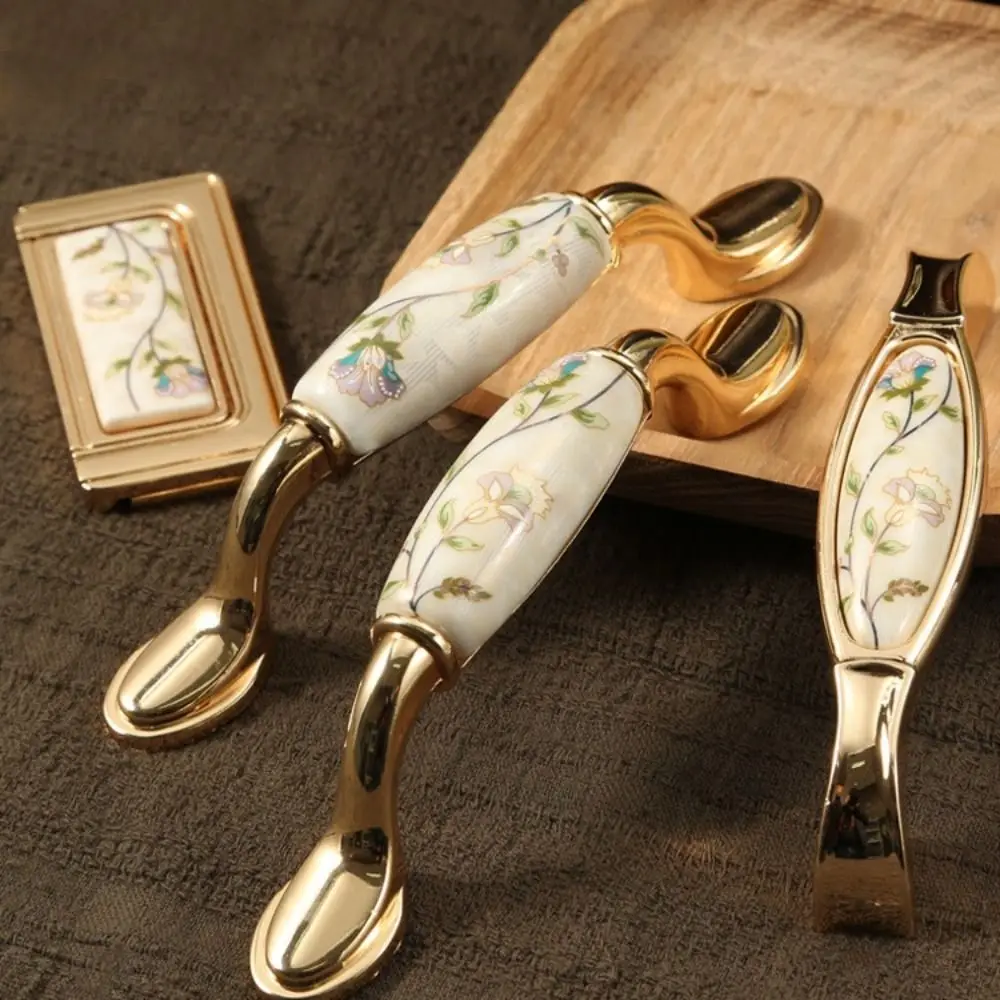 

Zinc Alloy Gold Kitchen Cabinet Handle Light Luxury Stylish Design Ceramic Drawer Pulls Modern Elegant European