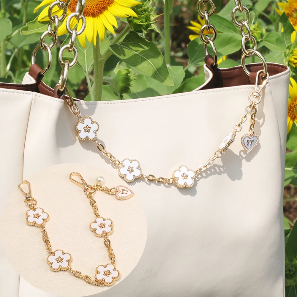 

Fashion New Product Black and White Camellia Flower Daisy Bow Trendy Jewelry Bag Chain Decoration Chain Phone Pendant Accessory