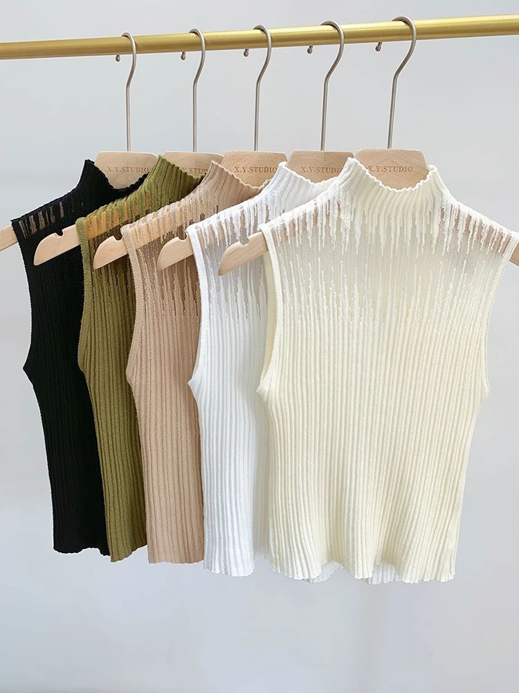 شبكة محبوك المرأة Y2K تانك القمم سترة الإناث سترة صوف من دون أكمام شيك قطع الشارع الشهير الصلبة نحيل الأبيض صديرية دائرية 2025