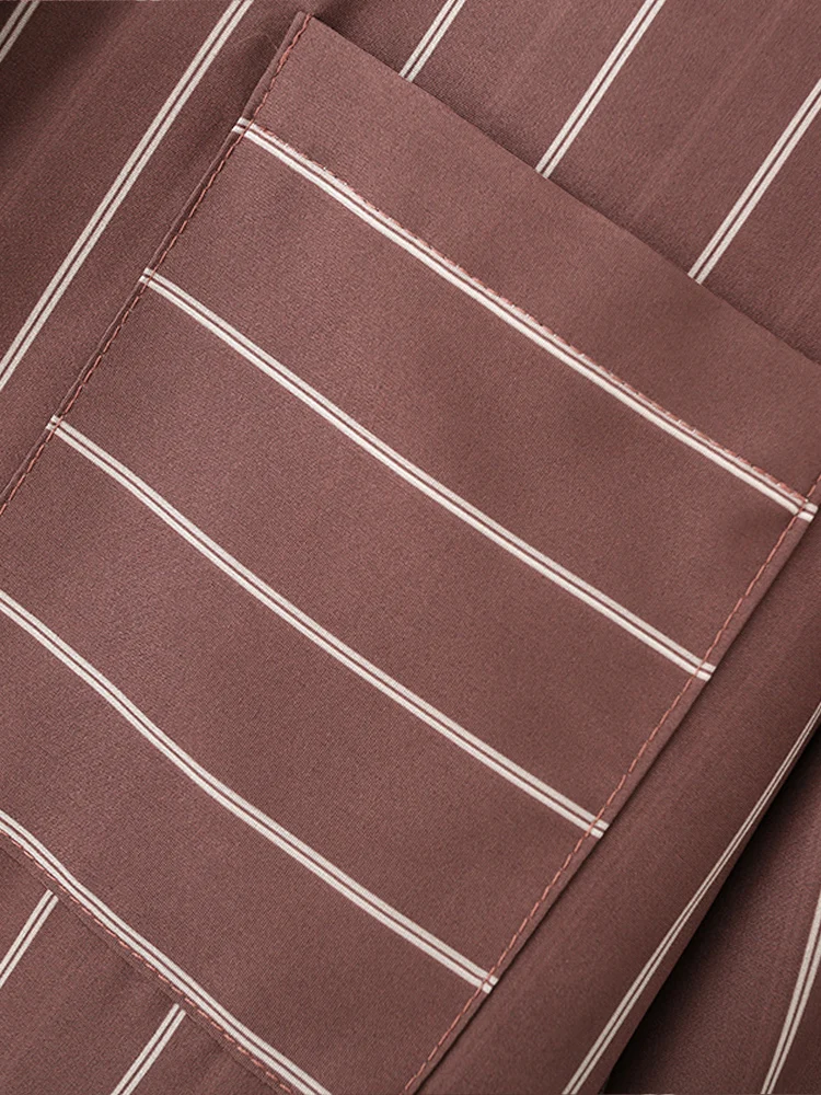 Kemeja wanita bergaya Eropa, serbaguna, elegan, kasual, lengan panjang, bergaris, dengan saku dan kerah.