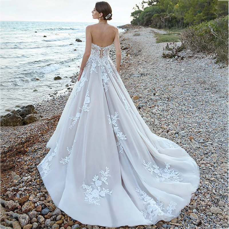 Elegante A-Lijn Appliques Kant Mouwloze Lange Strandbruid Jurken Robe De Mariée Bohème