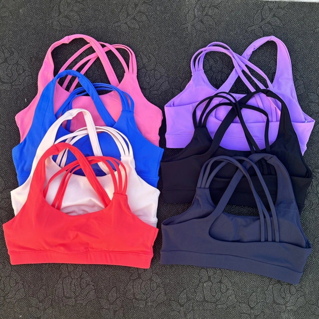 【セール中】ソリッドカラー レディース フィットネス スポーツブラ トップ ハイストレングス クロスショルダーストラップ ジム 下着 耐震 タイト ワークアウト 胸パッド付き