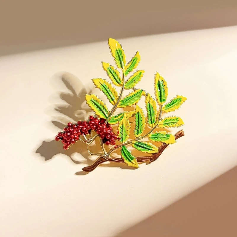 

Sorbus leaves high-end sense pin temperament niche enamel new brooch girls versatile fashion clothes decoration