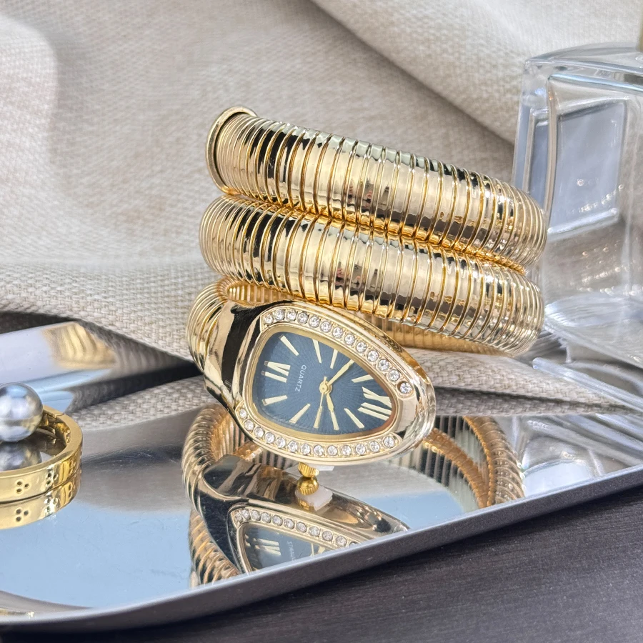 Women's fashion high quality Serpentine alloy watch with diamond case Celebrity style high-grade quartz bracelet watch