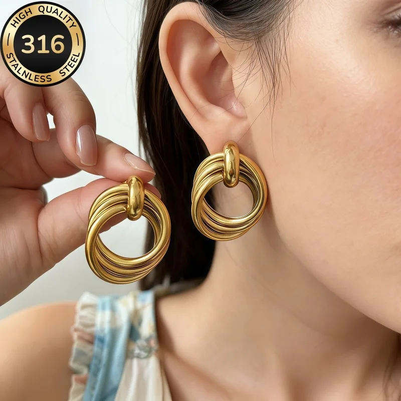 Titanium steel multi-layered interwoven circular earrings with a smooth geometric design, niche high-end earrings jewelry
