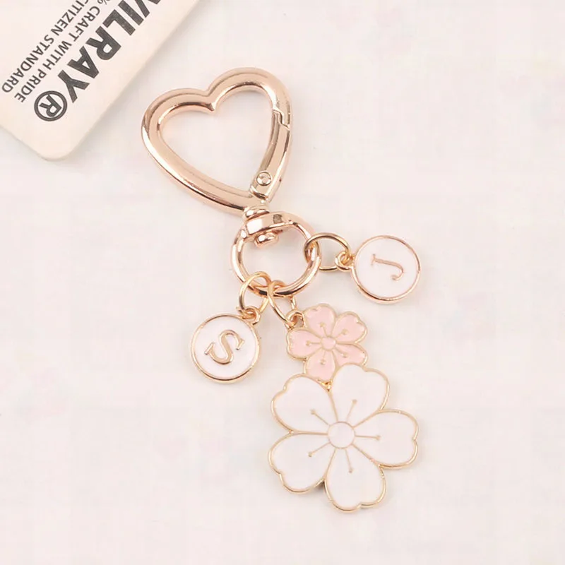 Creative Twin Flower Keychain Cute White Flower Letter Pearl Key Ring Love Key Ring Headphone Cover Bag Hanging Decoration Gift