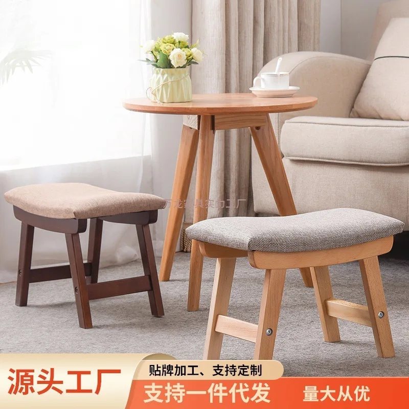 

Creative bench Simple solid wood shoe changing stool Living room pedal stool Household fabric low stool