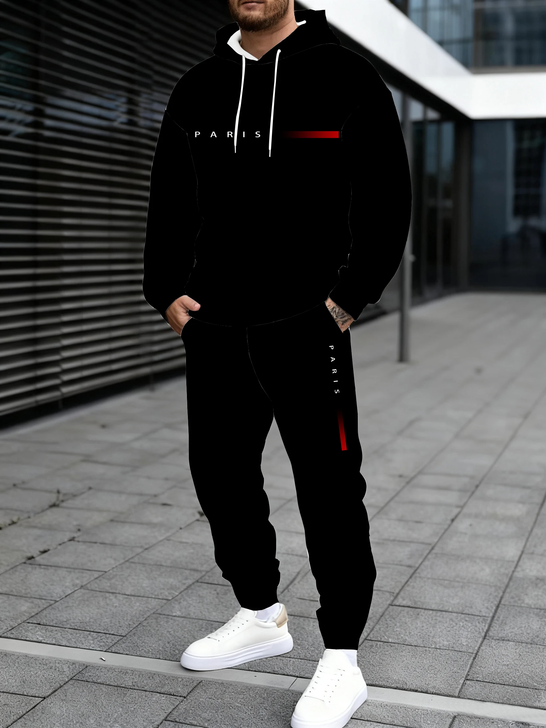 

A hooded sweatshirt paired with sweatpants printed with the word "PARIS" creates a versatile style