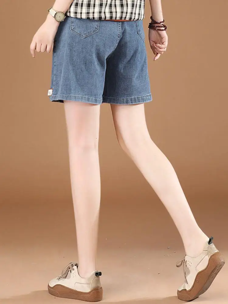 

Новые женские джинсовые шорты с высокой талией, эластичные, повседневные, свободного кроя, стройнящие, летние, прямые, длиной до колена, удобные джинсы