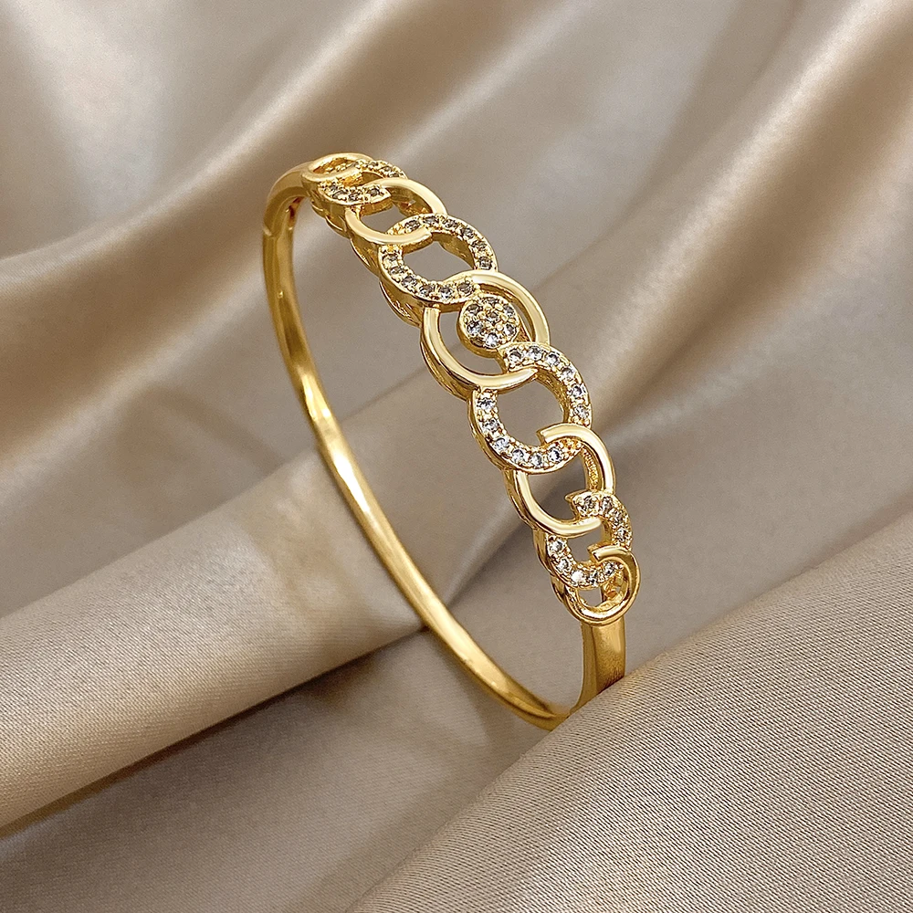 

Freetry Exquisite Inlaid Zircon Gold Plated Bracelet for Women Elegant Irregular Hollow Out Open Bangle Festival Jewelry Gift