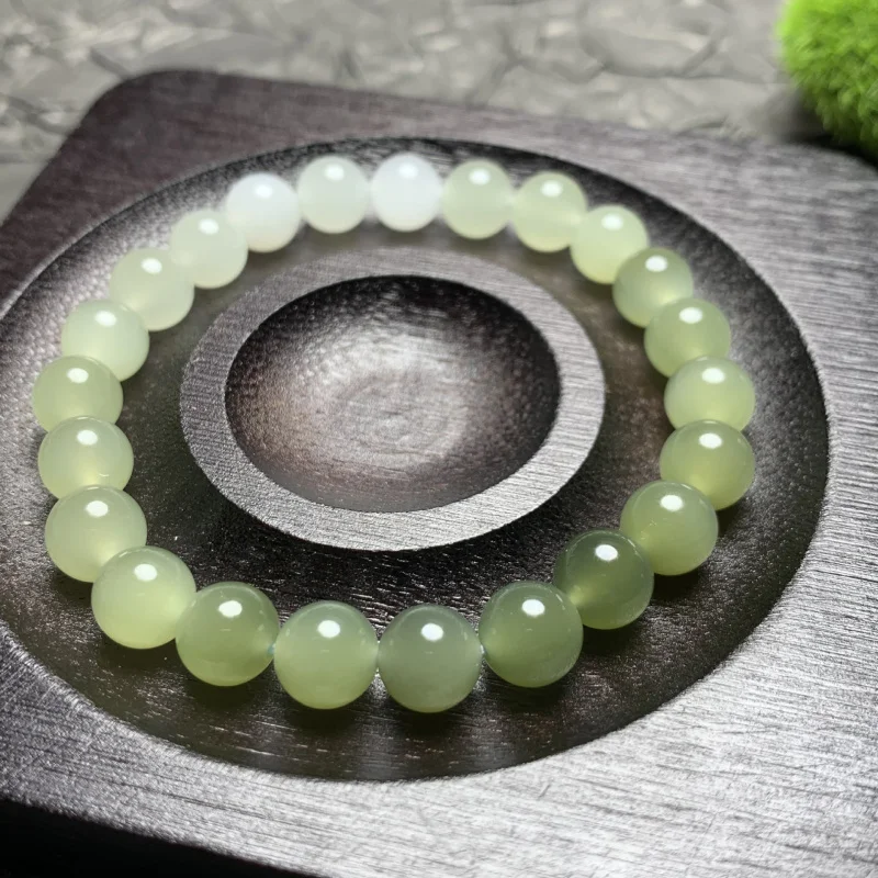 

Natural Hetian Jade Qing Shui Gradient Round Bead Card 8 Bracelet