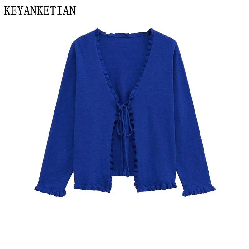 

KEYANKETIAN 2025 Autumn New Women's Two Fake Lace-up Knitted Tops Sweet style V-Neck Long Sleeve Agaric Decoration Short Sweater