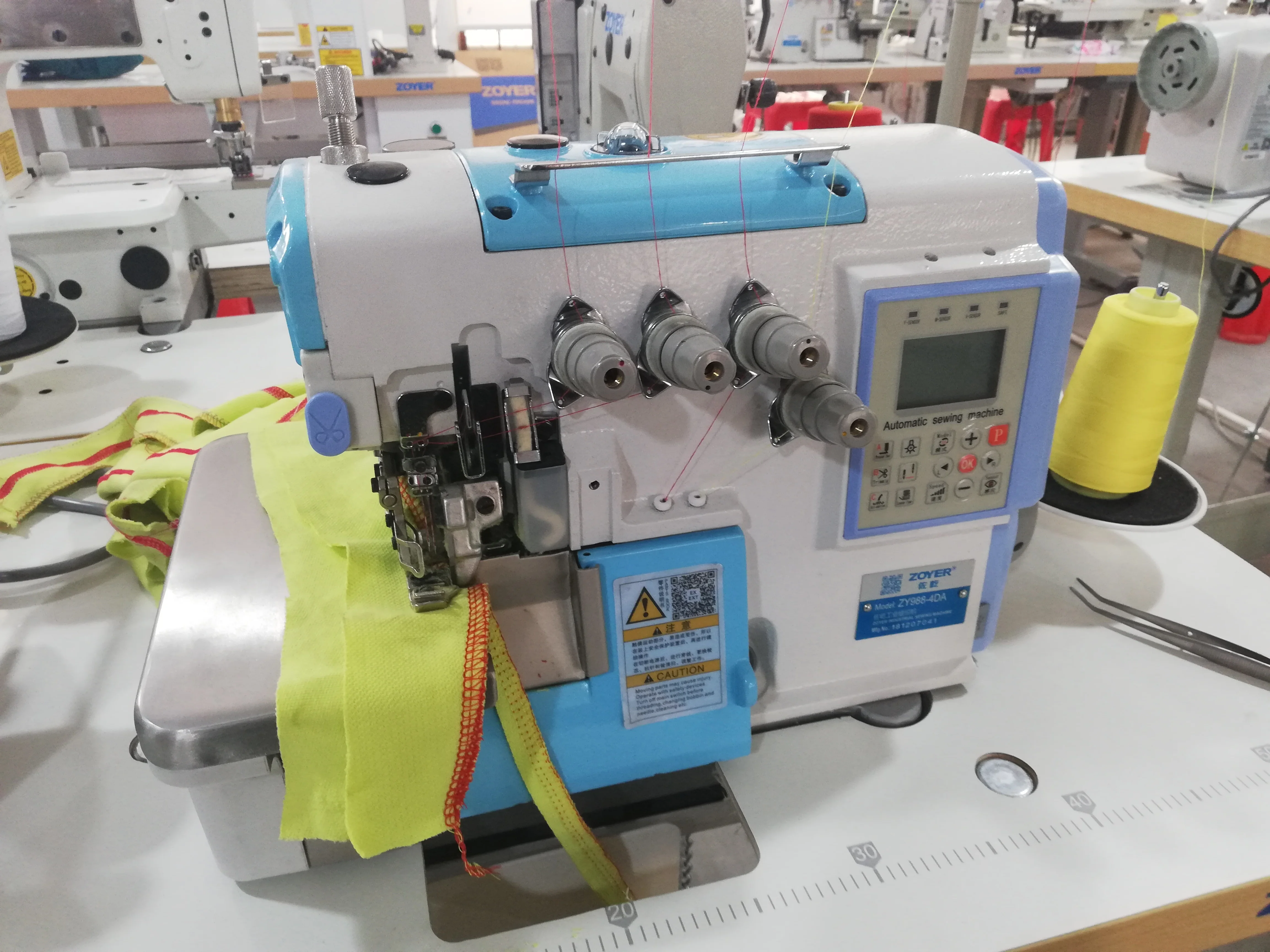 ZY988N-4DA New Look Zoyer EX Series 4-thread Super High Speed Direct Drive Auto Trimmer Full Automatic Overlock Sewing Machine
