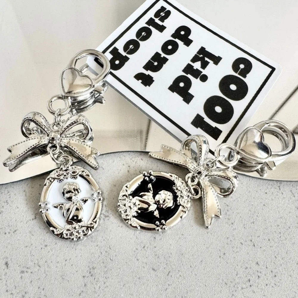 Kawaii Alloy Y2K Punk Key Holder Rock Vintage Harajuku Bowknot Keyring Metallic Texture Elegant Oval Bag Pendant Club