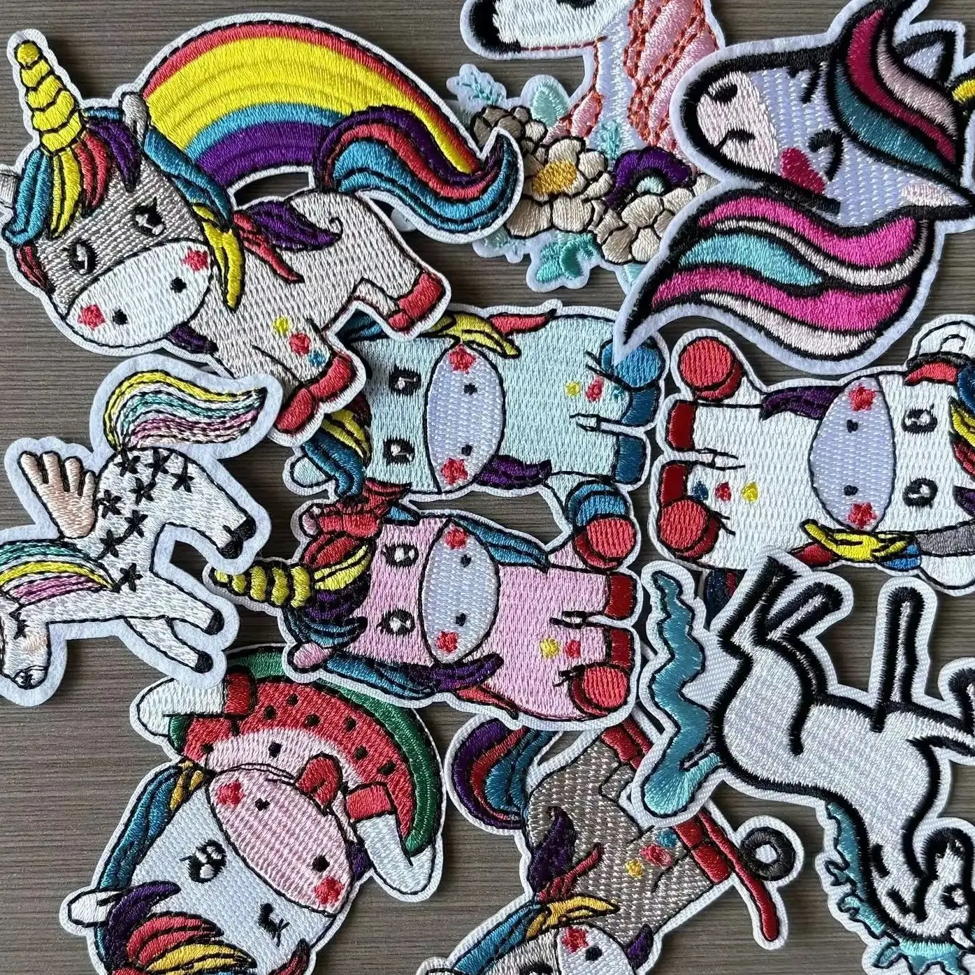 9-teiliges Set mit niedlichen Cartoon-Einhörnern zum Aufbügeln auf Kinderkleidung, zum Aufnähen auf Kinderjeans, Applikationen.