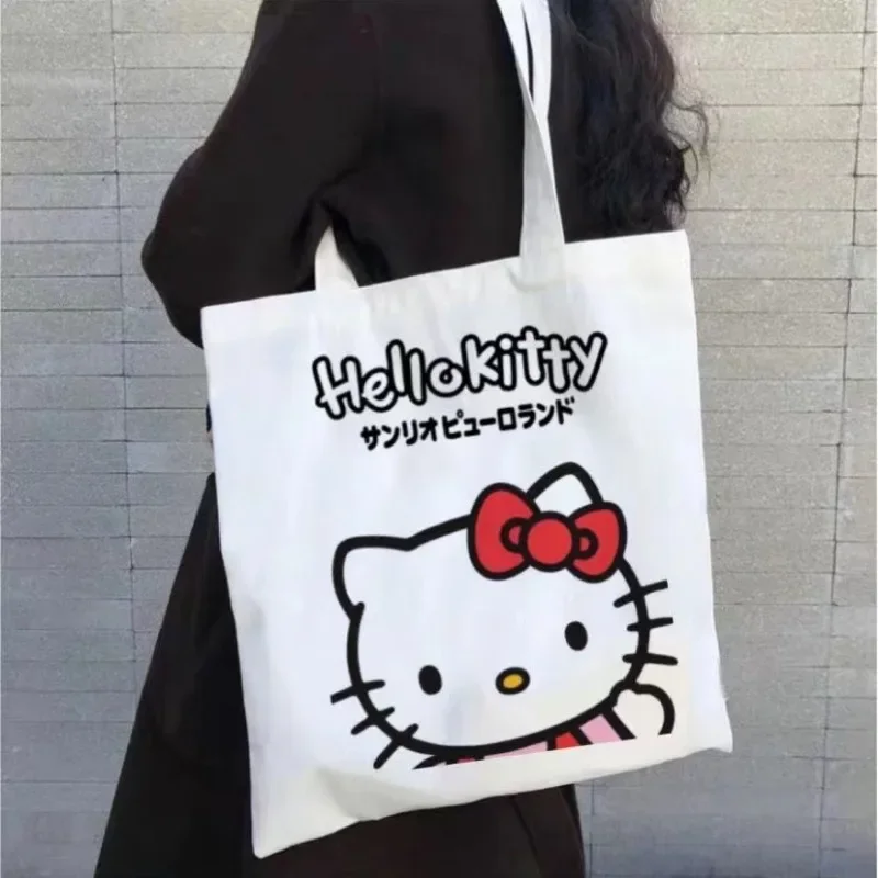 Sanrio-Bolso de mano de lona de Hello Kitty para mujer y niña, bolsa de hombro de compras de alta capacidad, bolso de viaje bonito, 2024