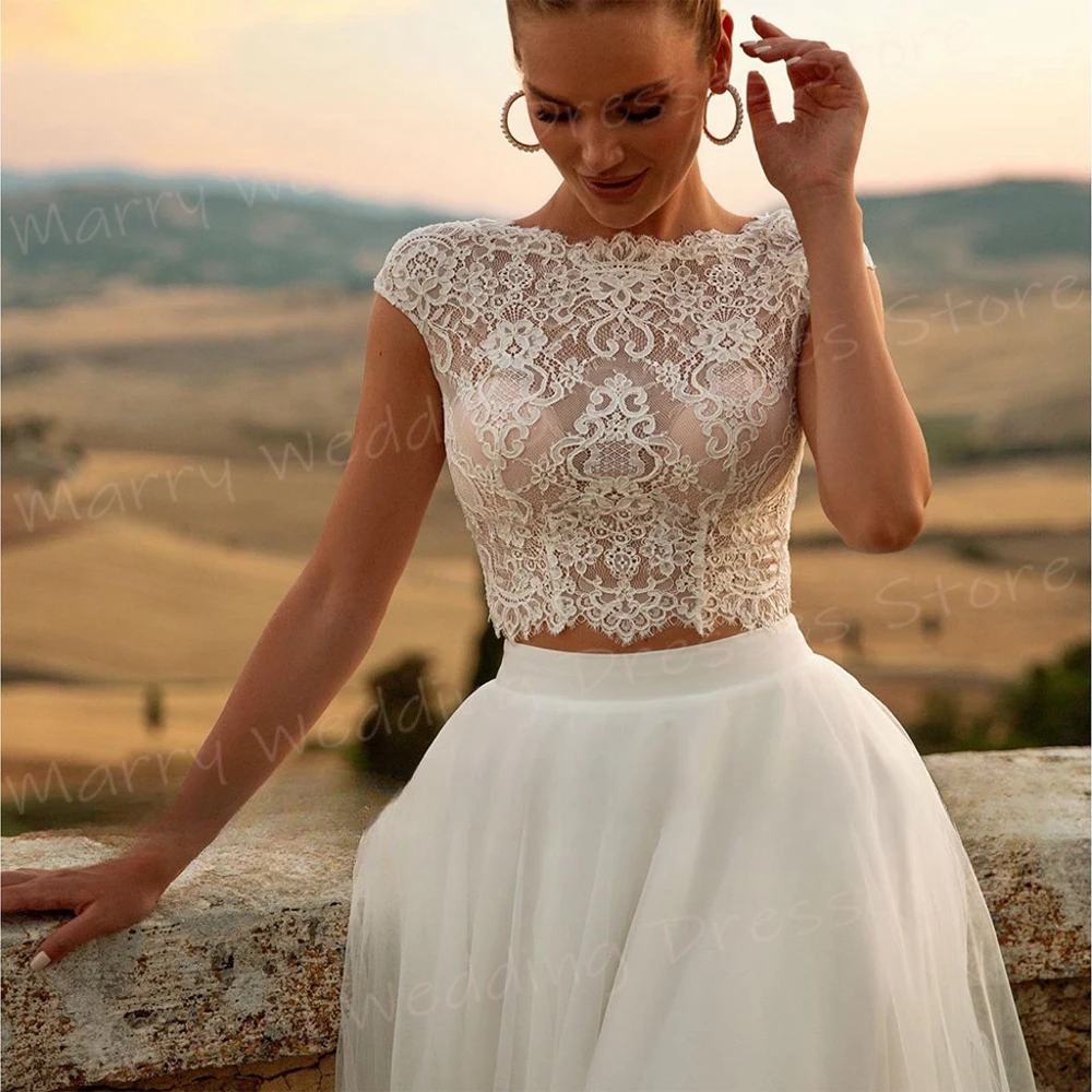 Wspaniałe suknie ślubne A Line Modne aplikacje Koronkowe suknie panny młodej O Neck Cap Sleeve Dla kobiet Tulle Vestidos De Novia Boda