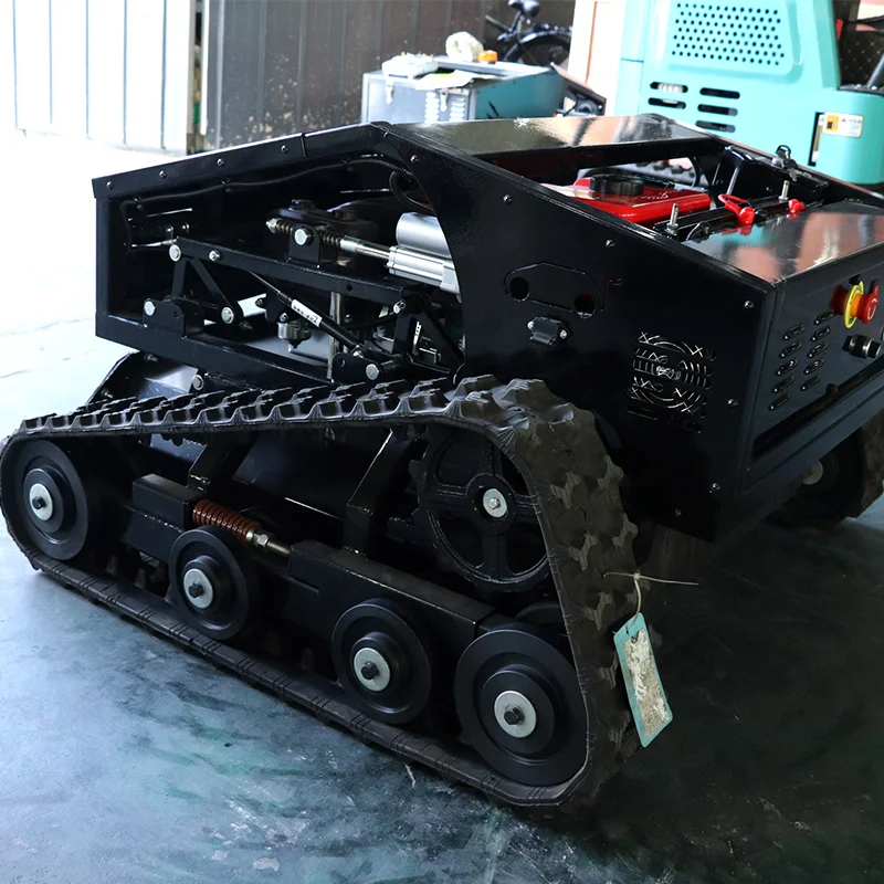 

Индивидуальная высококачественная оптовая продажа 500 мм беспроводная самоходная гусеничная газонокосилка с дистанционным управлением и снегоступом