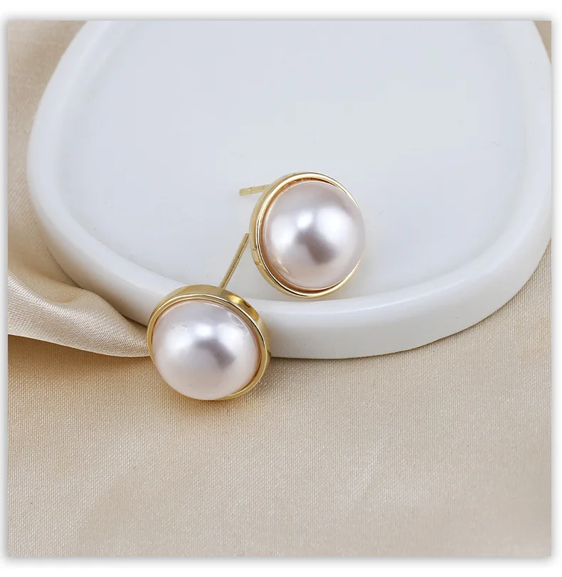 Gli orecchini ad ago in argento S925 sono un paio di piccoli orecchini da donna semplici, alla moda ed eleganti