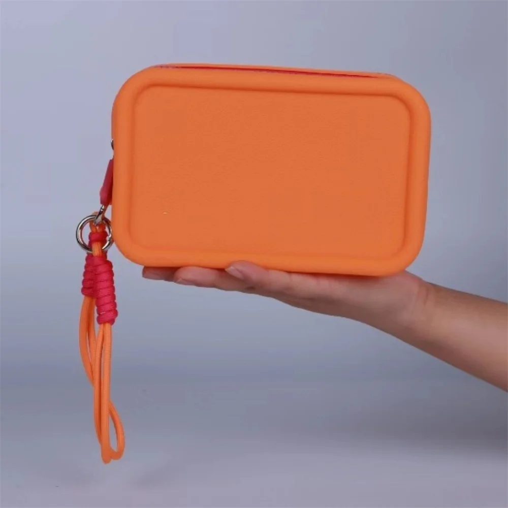 

Portable Lanyard Cosmetic Bags Candy Color Silicone Makeup Bag with Braided Wrist Rope Waterproof Toiletries Lipstick Pouch