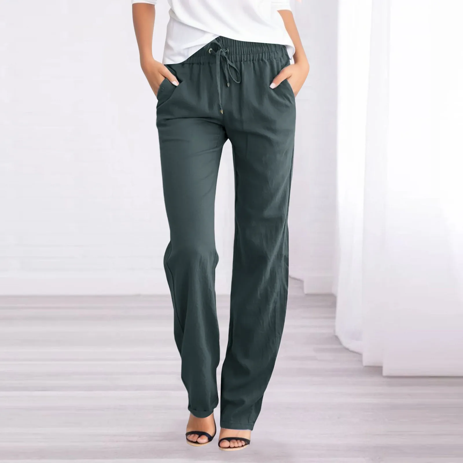 Pantaloni Casual con coulisse da donna primavera ed estate pantaloni lunghi elastici a vita alta in tinta unita moda femminile con tasche pantaloni