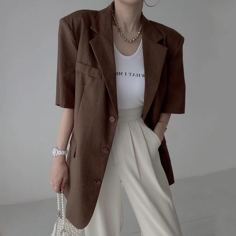 Elegancki letni, vintage'owy, uniwersalny, luźny garnitur w kratę, damska moda, casualowy, zapinany na guziki, krótki rękaw, odzież wierzchnia.