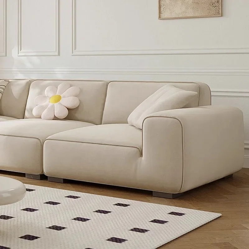 أريكة جلدية، أريكة جلدية إيطالية فاخرة خفيفة للخدش على شكل قطة، شقة بسيطة الحجم في غرفة المعيشة، كريم صف مستقيم