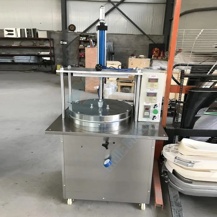 Taco Bell fabrique une machine à pain indien automatisée Parata Roti Tortilla