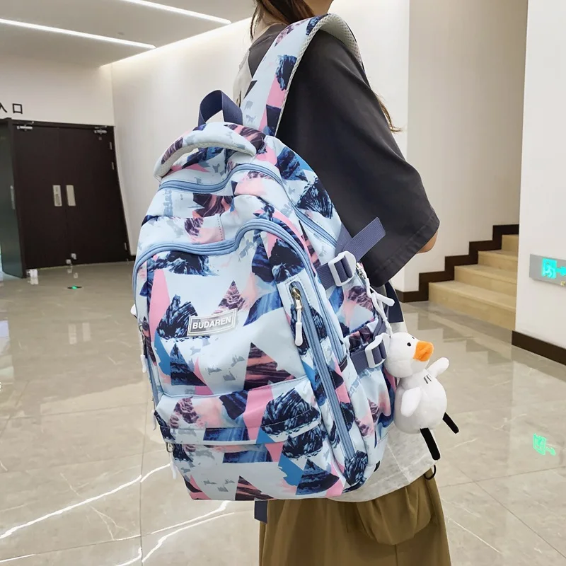 Bolsa de libros con estampado para mujer y hombre, morral escolar con grafiti para ordenador portátil, mochila de viaje para Universidad, a la moda, novedad