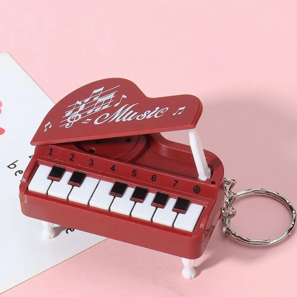 

Solid Color Mini Electronic Piano Keychain Vertical Rabbit Mini Piano Key Pendant Bear Cat Musical Instrument Piano Keyring