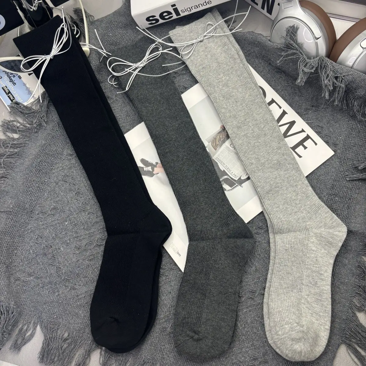 European trendy socks for women, 2024 autumn and winter new item, solid color slimming calf socks, bow tie long tube socks