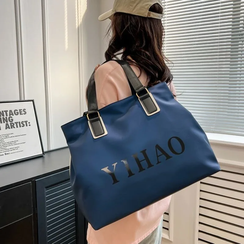 

New Large Capacity Waterproof Nylon Cloth Women's Bag Big Bag Women's Short Distance Portable Travel Bag Carry Oxford Exquisite