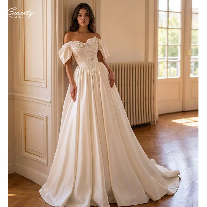 Graceful Wedding Dresses Satin With Pearls A-Line Ball Gown Sleeveless Boat Neck Customized Bride Dress Button Robe MariéE Satin