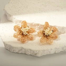 Autumn French fashion retro stainless steel ladies raffia braided white shell flower earrings holiday gift holiday date