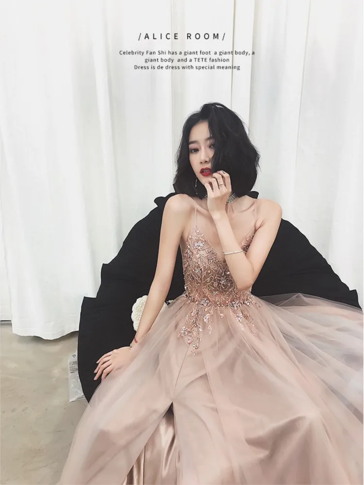 

A long elegant toasting dress with exquisite halter straps and slit