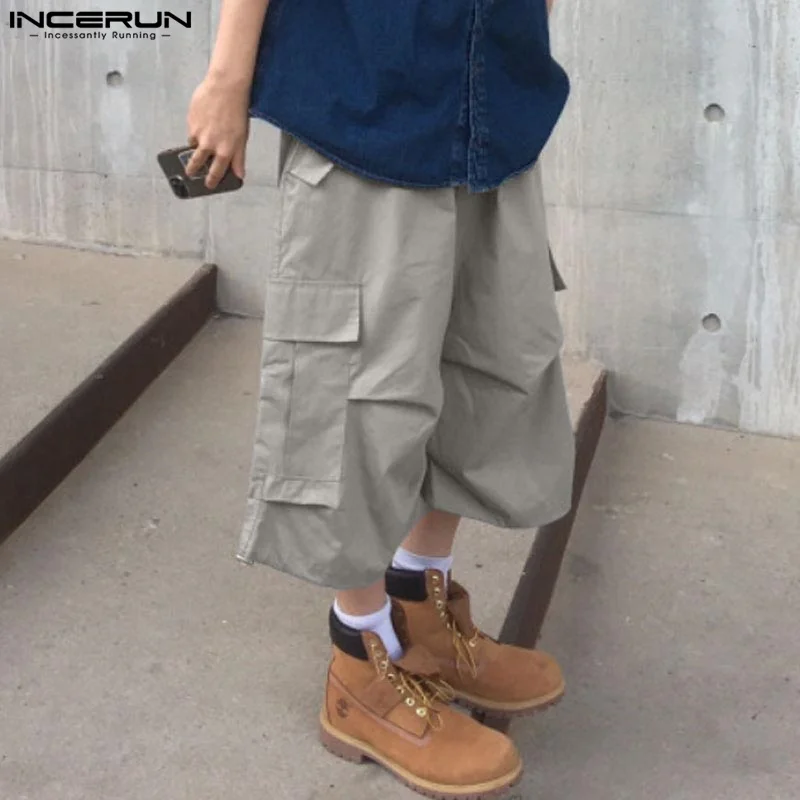 INCERUN 2025 الكورية نمط أنيق Pantalons الرجال الصلبة جيب البضائع السراويل الترفيه بسيط مريح العجل طول السراويل S-5XL