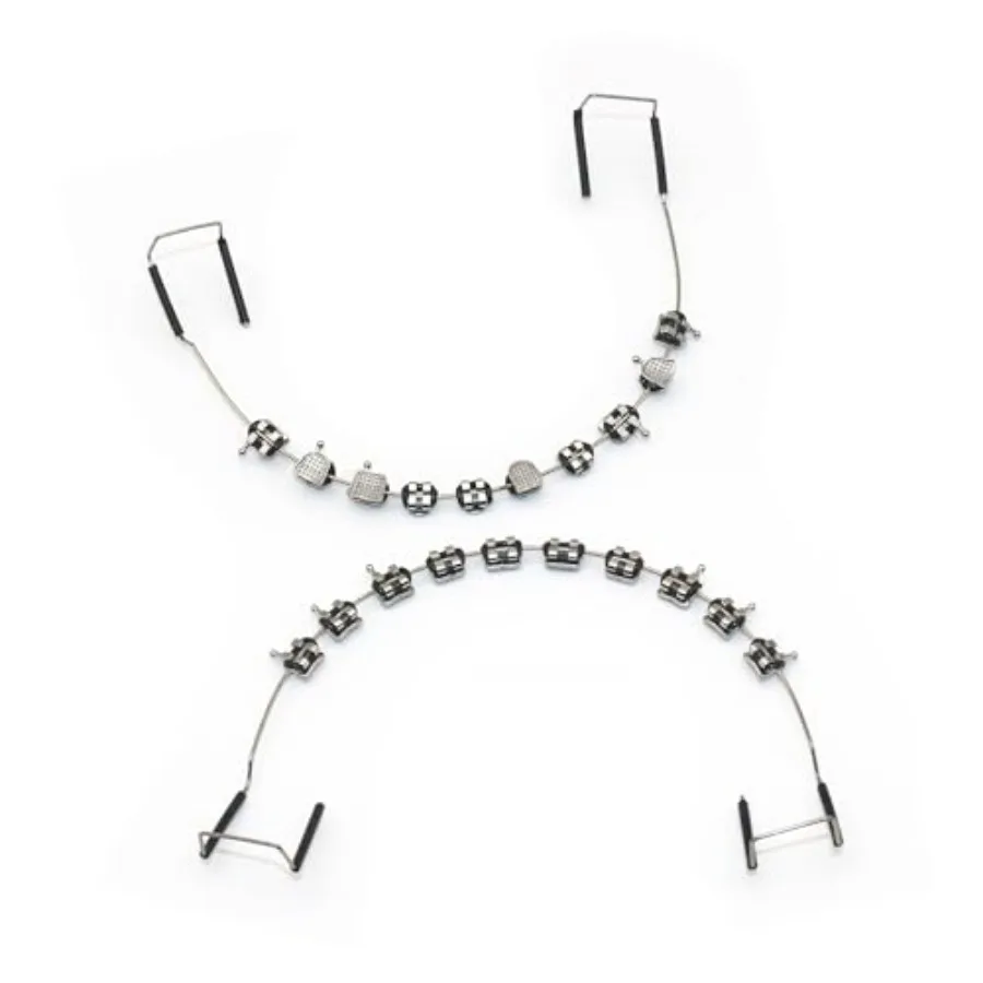 

Pack Temporary dental decorations with metal wires, metal brackets and orthodontic ligatures, props for orthodontists to explai