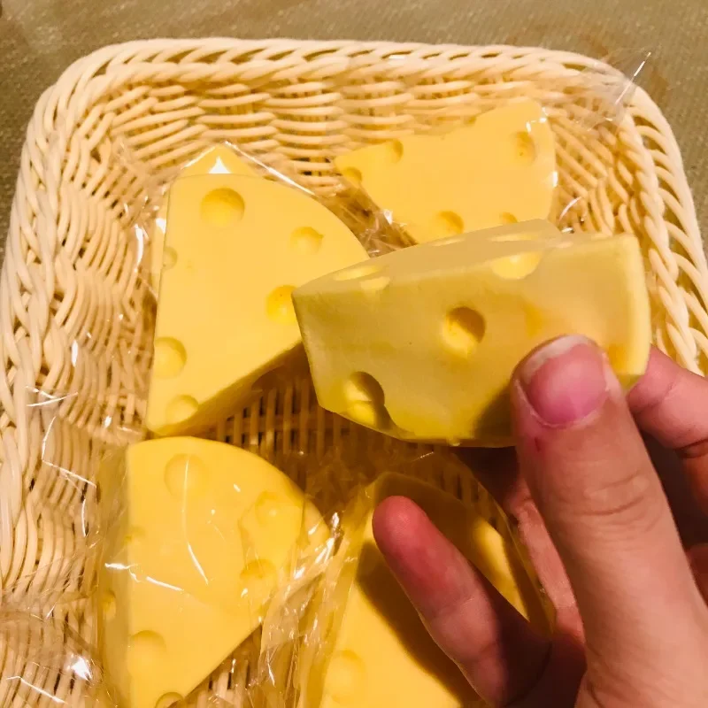 Giocattolo di sfiato di decompressione con pizzico a rimbalzo lento al formaggio appiccicoso Squishy a lenta crescita