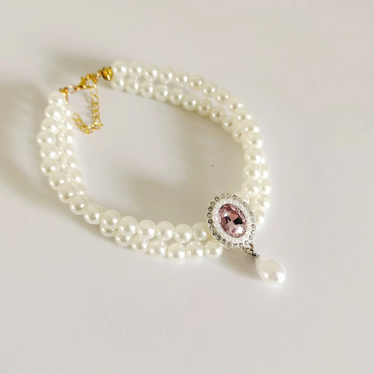 Image of Luxuriöse 2-reihige Perlen-Welpen-Katzenhalsband-Halskette für Katzen, modisches Haustier-Kristall-Schmuckzubehör mit glitzerndem Diamant-Herz-Anhänger