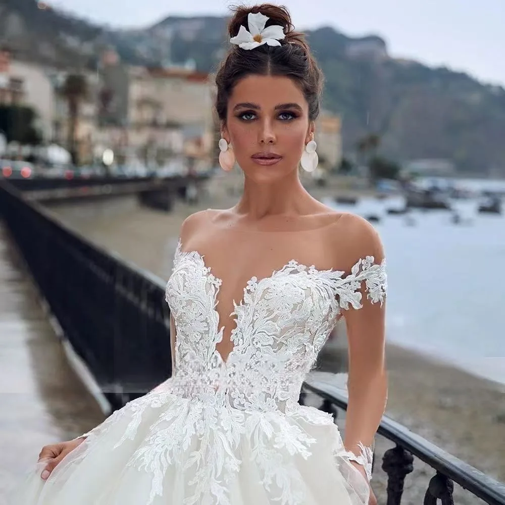 تخصيص فساتين زفاف فاخرة مزينة بالدانتيل مثير الوهم كم طويل زر ذيل شابيل ألين فستان زفاف Vestidos De Novia