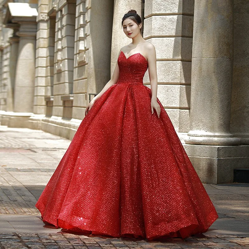 

Puffy one-shoulder red floor-length dress