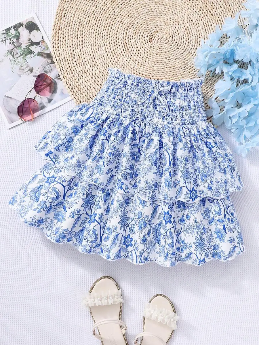

Синяя мини-юбка с цветочным принтом, многоярусными оборками и эластичной талией