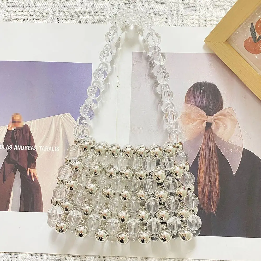 مطرز حقيبة من القماش المرأة 2025 صيف جديد الفرنسية كسول نمط شيك تصميم فضي شفاف الطازجة الحلو الاكريليك حقيبة يد الإناث