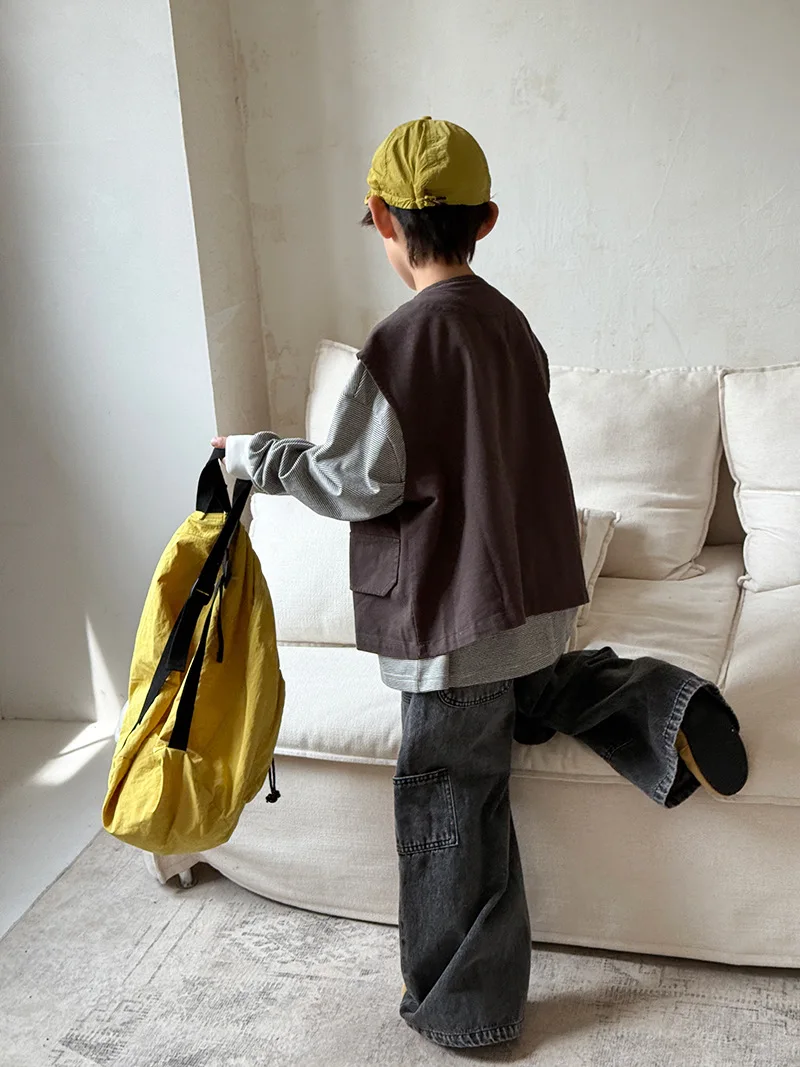 سترة جديدة للأولاد والبنات لربيع وخريف 2025 على الموضة الكورية ملابس خارجية غير رسمية يومية تناسب الجميع بلون سادة بدون أكمام #6