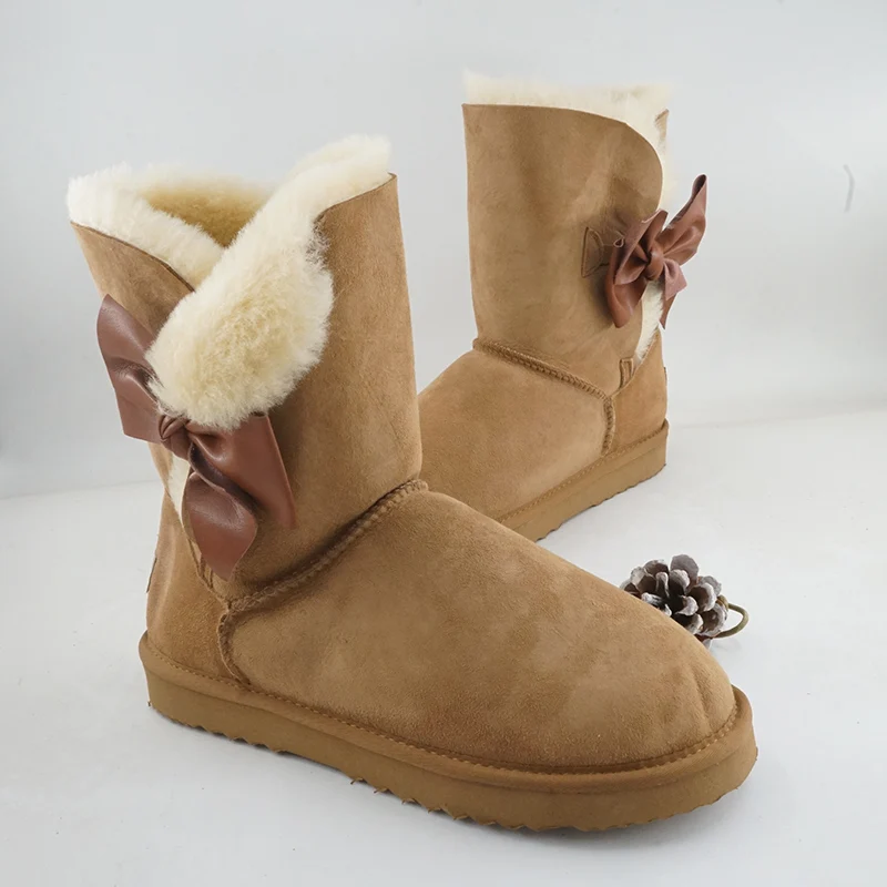 Moda laço botas de neve de pele natural novos sapatos femininos pele de carneiro genuína pele real 100% lã inverno meados de bezerro botas de neve