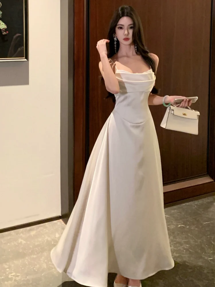 Femmes élégantes robes sans manches été nouveau français Spaghetti sangle robes Mujer a-ligne soirée de mariage robe mi-longue nouveau