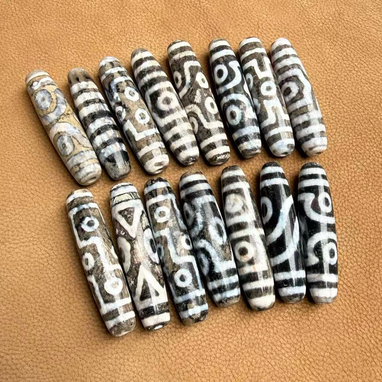 

Snowy cinnabar agate sky beads, each with cinnabar 9 Eyes celestial beads pendant