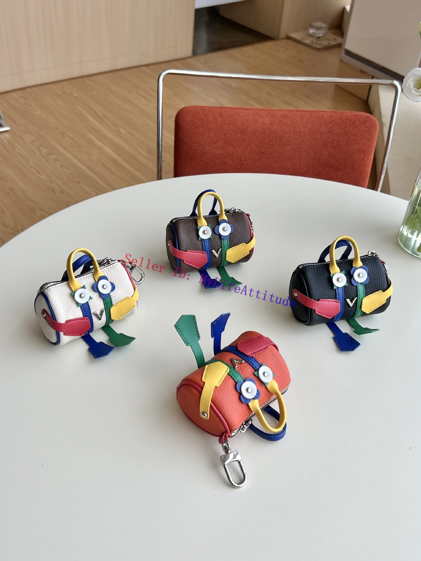 جلد حقيقي جميل روبوت سريع حقيبة سحر حلية لحقيبة اليد على ظهره سيارة محفظة المفاتيح 4 ألوان