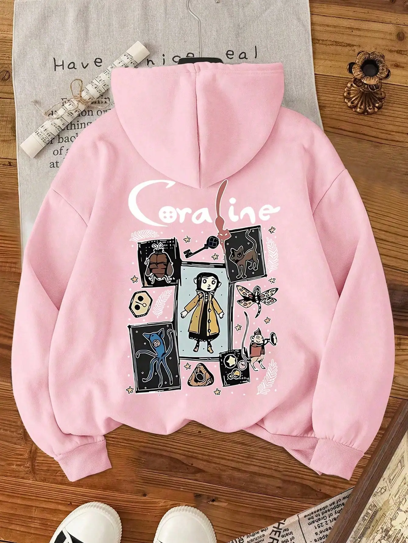

Pink Cartoon Print Dropped Shoulder Hoodie with Pocket for Casual Wear