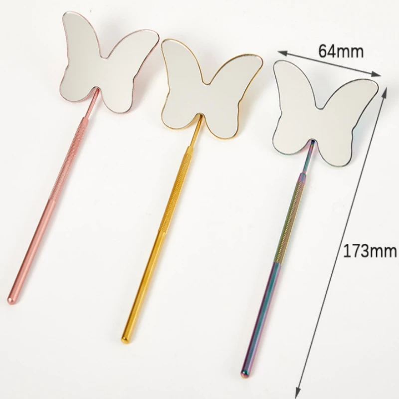 Grenzüberschreitender, exklusiver, schmelzender Wimpernverlängerungsspiegel aus Edelstahl für die Schönheitswimperninspektion, schmetterlingsförmiger Inspektionsspiegel